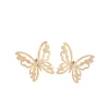 Arete dorado en bronce y baño de oro 24k y dije. Marca Brazz by Roel, con Roel Joyas puedes emprender e impulsar tu negocio, tenemos los mejores precios del mercado
